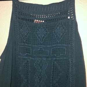 A turquoise tank top